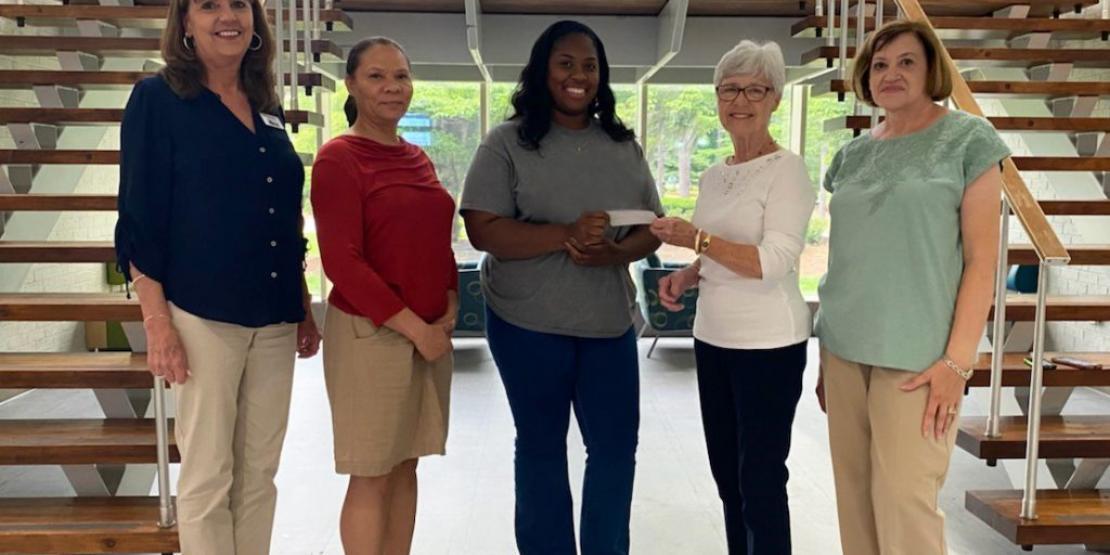 Pictured left to right: Craven CC Financial Aid Advisor Carolyn Ward, AAUW Co-President Aeleen Sherzer, student Shaundel Godfrey, AAUW Scholarship Co-Chair Ann Corby, and AAUW Co-President and Scholarship Co-Chair Theresa Harigan.