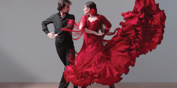 A man and woman dancing flamenco